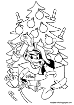 Goofy slipping under the christmas tree
